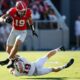 Georgia tight end Brock Bowers (19) avoids a tackle from Tennessee Martin safety Jack Lucas (19) during the first half of a NCAA college football game against Tennessee Martin in Athens, Ga., on Saturday, Sept. 2, 2023.